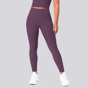 Detailed close-up view of high-waisted stretch yoga leggings in solid purple, perfect fit.