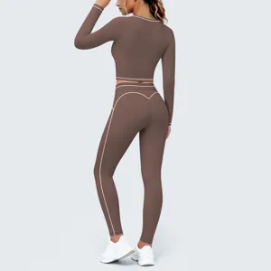 Detailed view of brown contrast piping yoga set back design showing fitted crop top and leggings.