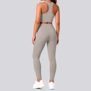 Detailed back view of grey activewear set with racerback sports bra and high-waist leggings.