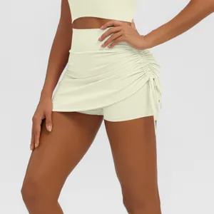 Detailed view of women high waist ruched athletic yoga skirt shorts, breathable fitness wear.
