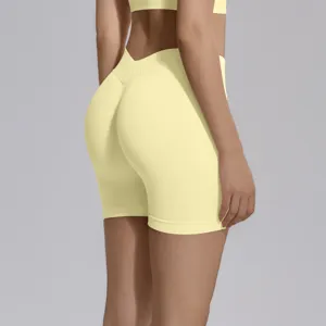 High waist seamless yoga shorts with V-waist and peach lift design for fitness and running.