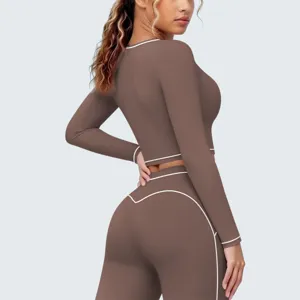 Kontrastbiese hochelastisches atmungsaktives Sport Langarm Crop Top für Yoga Joggen.