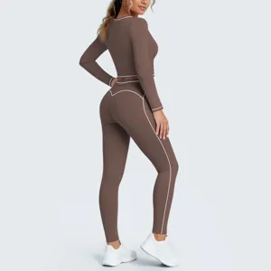 Brown long sleeve yoga set detail, contrast piping crop top and leggings for fitness workouts.