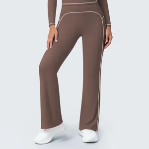 Brown high waist flare athletic pants detail with stylish white contrast piping design.