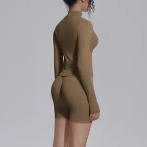 Seamless long-sleeve fitness yoga top and shorts set, high elasticity activewear for workout.