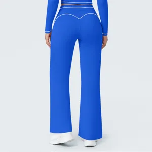 Blue high-waisted wide-leg yoga pants back view with contrast white piping details.