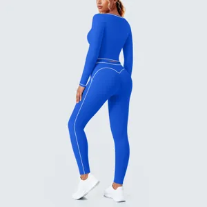 Detailed back view of royal blue athletic yoga set featuring contrasting white piping trim.