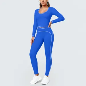 Close-up detail of blue yoga set, contrast white piping, soft brushed fitness activewear.
