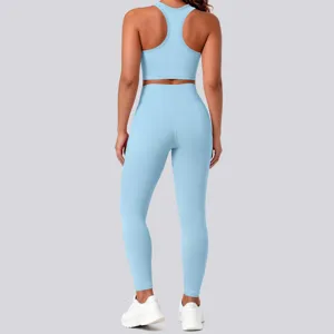 Light blue seamless yoga set for women, breathable backless sports bra and high waist leggings.