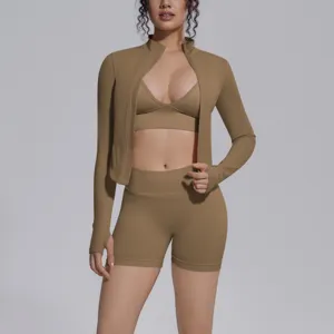 Seamless solid color 3-piece activewear set, long sleeve jacket sports bra and yoga shorts.