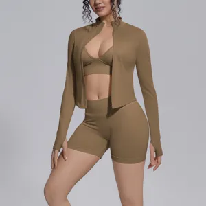 Detail shot of seamless khaki sports fitness activewear jacket and shorts set, high elasticity.