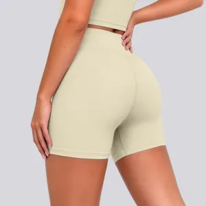 Detailed back view of high-waisted seamless yoga shorts in light beige, breathable fit.