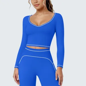 Königsblaues Langarm-Crop-Top und Leggings Fitness-Yoga-Set mit Kontrastpaspelierung.