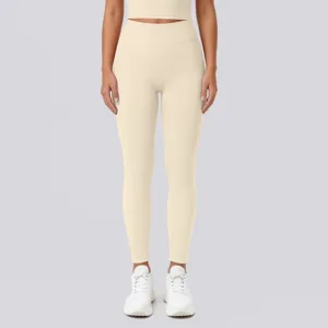High waist stretch beige yoga leggings fabric detail, seamless fit for daily fitness workout.
