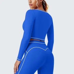 Damen blaues sportliches Langarm-Crop-Top und Fitness Leggings Set Detailansicht.