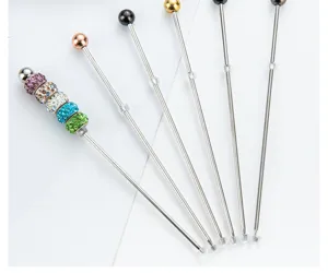 Stainless steel cake tester needle baking tool with rhinestone decorative beads for kitchen use.