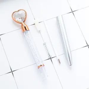 Crystal heart ballpoint pen with dismantled parts, cute stationery for office and school use.