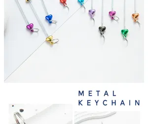 Metal keychain rod with colorful heart charms for DIY crafts and jewelry making accessories