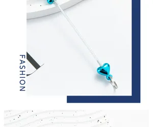 Blue heart beaded bar for DIY jewelry crafting keychain zipper charm accessory close up view