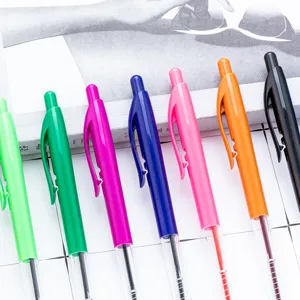 Multicolor plastic retractable ballpoint pens, transparent barrel business office supplies.