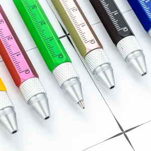 Multifunctional metal tool pen set with built-in ruler, ballpoint pen, and screwdriver tips.
