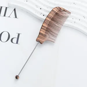 Wood grain tail comb with metal pin and bead end, professional salon fine tooth styling tool.