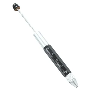 Multi-functional metal tool pen with scale ruler and beadable design for outdoor use.