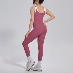 Detail view of a pink and white contrast two-piece yoga set, activewear for fitness.