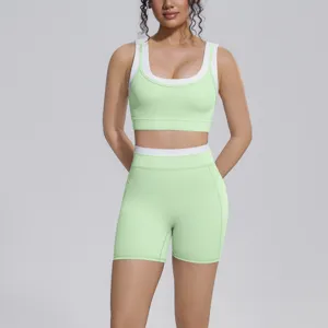 Detail view of color-blocked nude-feel active yoga set, featuring backless sports bra and shorts.