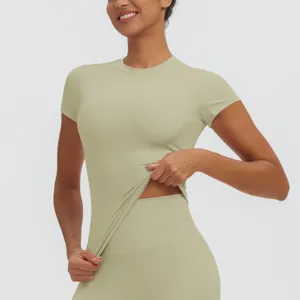 Detailed view of women's short-sleeve fitness top, quick-dry slim yoga wear for running.