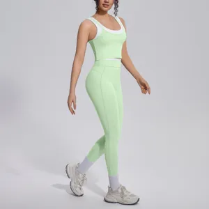 Contrast color ribbed crop top and high-waist leggings yoga set for fitness and running.