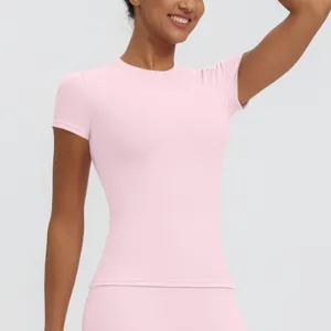 Detail view of the women's slim fit short sleeve t-shirt in pink, ideal for sports and yoga.