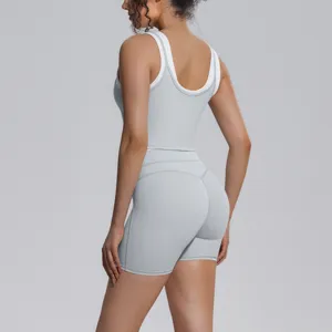 Gray white layered yoga tank top and shorts sports set detail back view breathable activewear.
