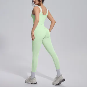 Detail view of green contrast ribbed yoga set sports bra and leggings for fitness running.