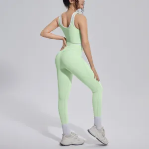 Light green activewear set yoga outfit featuring contrast tank top and high waist leggings.