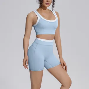 Detail view of light blue activewear set featuring supportive sports bra and high-waist shorts.