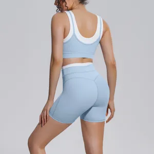 Color-blocking yoga set detail showcasing the stylish backless bra and high-waisted shorts.