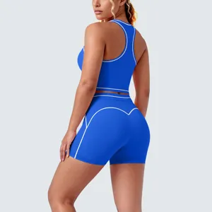 Blue contrast piping racerback sports bra and athletic yoga shorts set for women fitness.