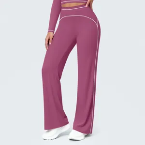 Detail view of high-waisted wide-leg yoga pants featuring stylish contrast piping.