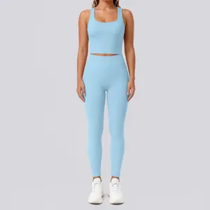 Light blue seamless fitness yoga set with racerback crop top and high waist leggings.
