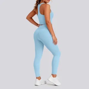 Back details of light blue seamless yoga set, tight crop top and leggings for fitness.