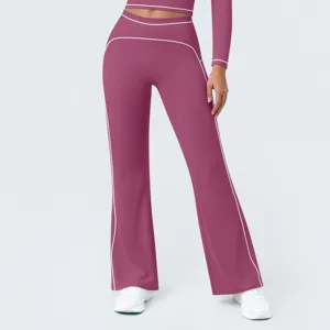 Women's high waist contrast piping flared yoga pants and top activewear set detail view