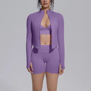Detailed view of the purple seamless athletic jacket and high waist fitness shorts.