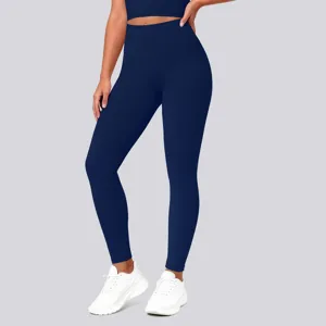 High waist yoga pants detail showcasing elastic waistband and tight fit for workout and fitness.
