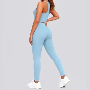 Light blue activewear set featuring a sleeveless crop top and high waist yoga leggings.