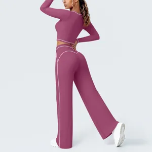 Stilvolles Langarm-Crop-Top und weite Yoga-Hose, perfekt für Fitness, Laufen und Training.
