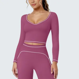 Damen Sportbekleidung Langarmshirt und Leggings Set mit kontrastierenden weißen Paspeln.