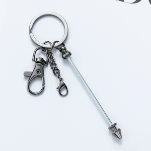 Porte-clés créatif en métal pendentif pointe, accessorio de sac élégant et design unique.