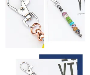 DIY metal keychain with colorful rhinestone beads, lobster clasp and bullet pendant for bags.