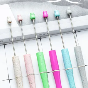 Eco-friendly wheat straw DIY beadable pen set with long metal rod in colorful pastel designs.